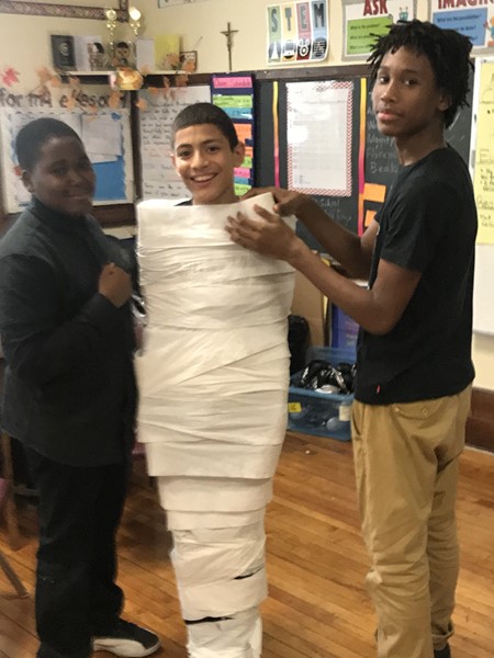 Making of a Mummy in 8th Grade Halloween 2019 at DLEACS